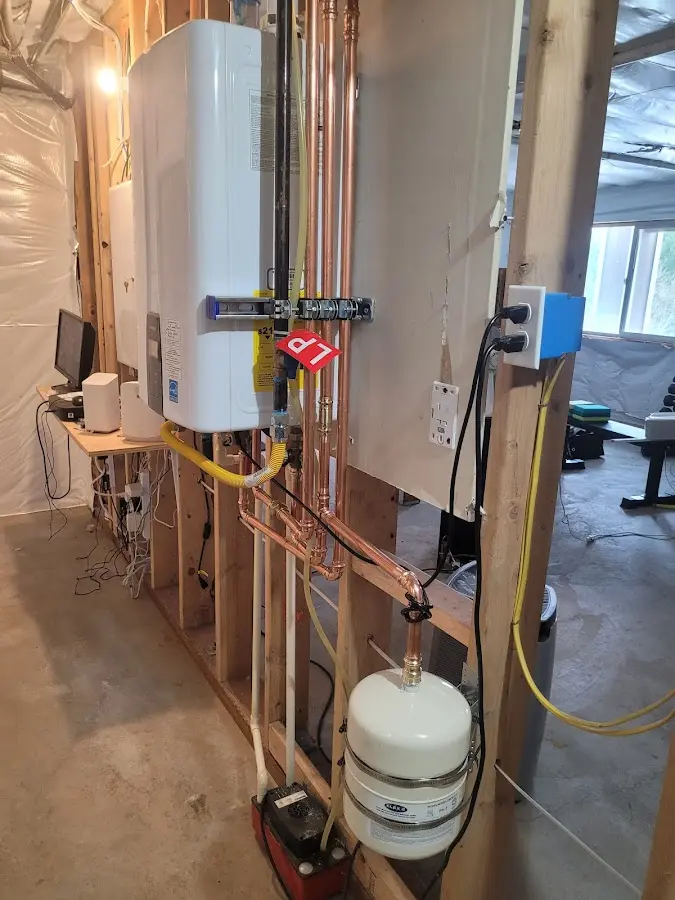 Licensed plumber repairing a kitchen sink in Egg Harbor City